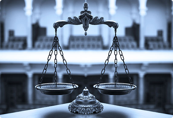 Image of a scale with two sides, symbolizing balance and equality - The Law Office of Rebecca Sommer